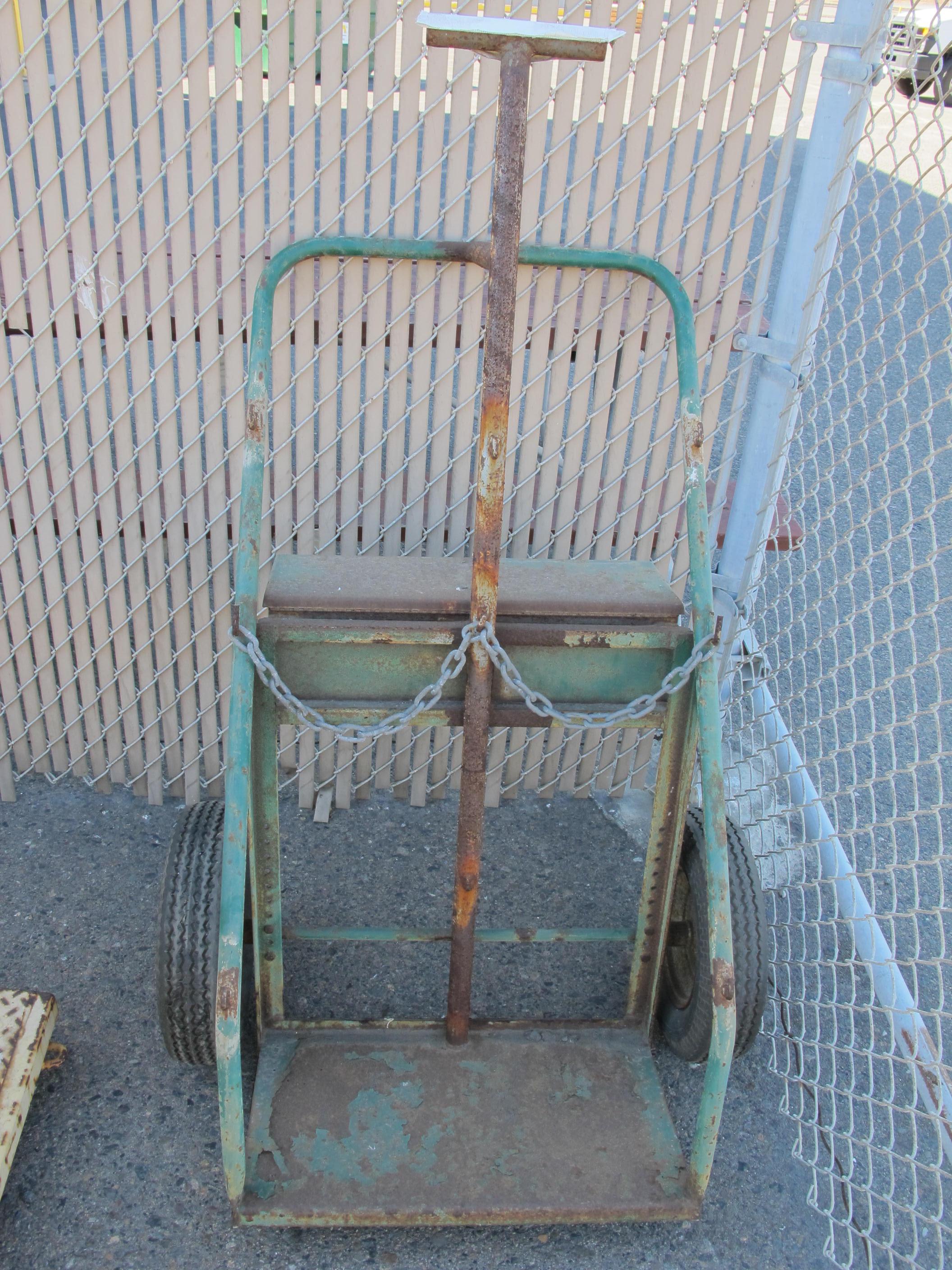 LOT TO INCLUDE: DRUM LIFT RACK, 2 TON MAX, WITH 2 BOTTLE CAP DOLLY. LOADING & HANDLING FEE $15-4595